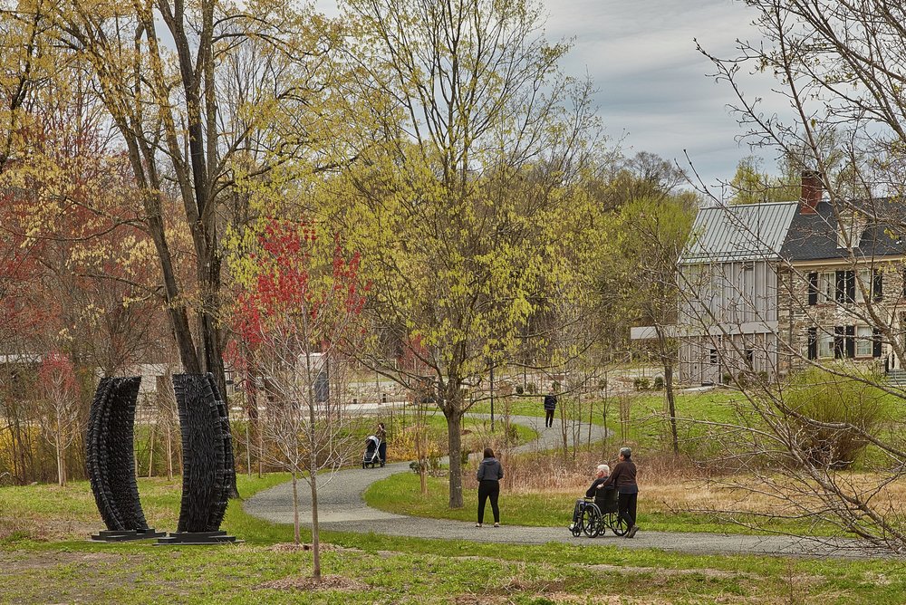 An entrance path connects the Outdoor Lobby and visitor pavilions to Storm King’s grounds.